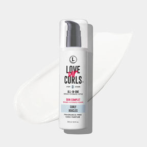 Bottle of 'Love My Curls' hair care product on a white background
