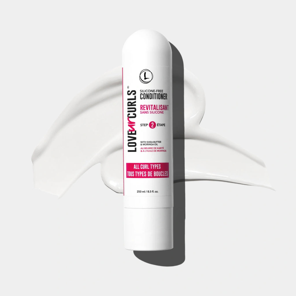 Love Ur Curls conditioner bottle on a white background