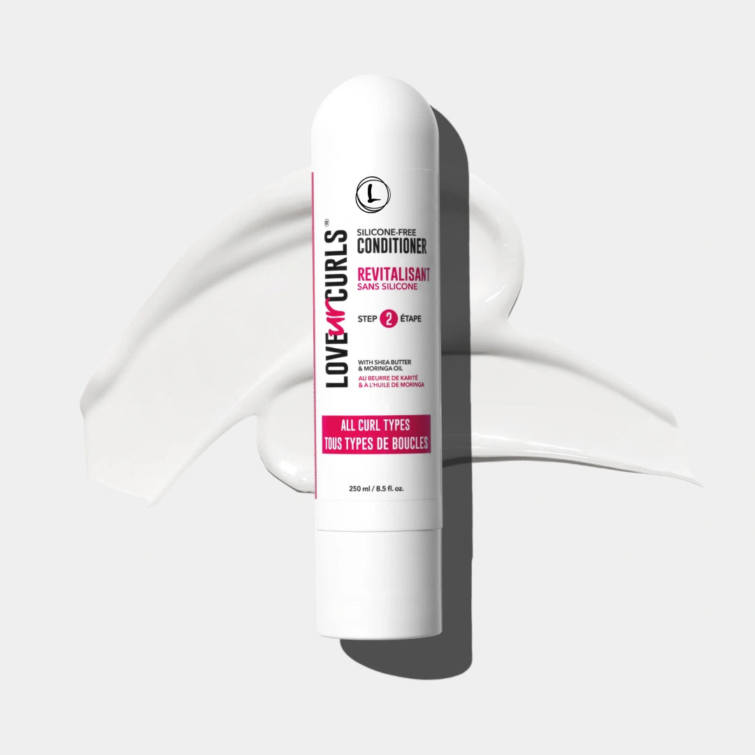 Love Ur Curls conditioner bottle on a white background