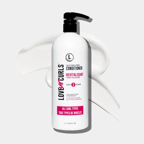 Love Ur Curls conditioner bottle on a white background
