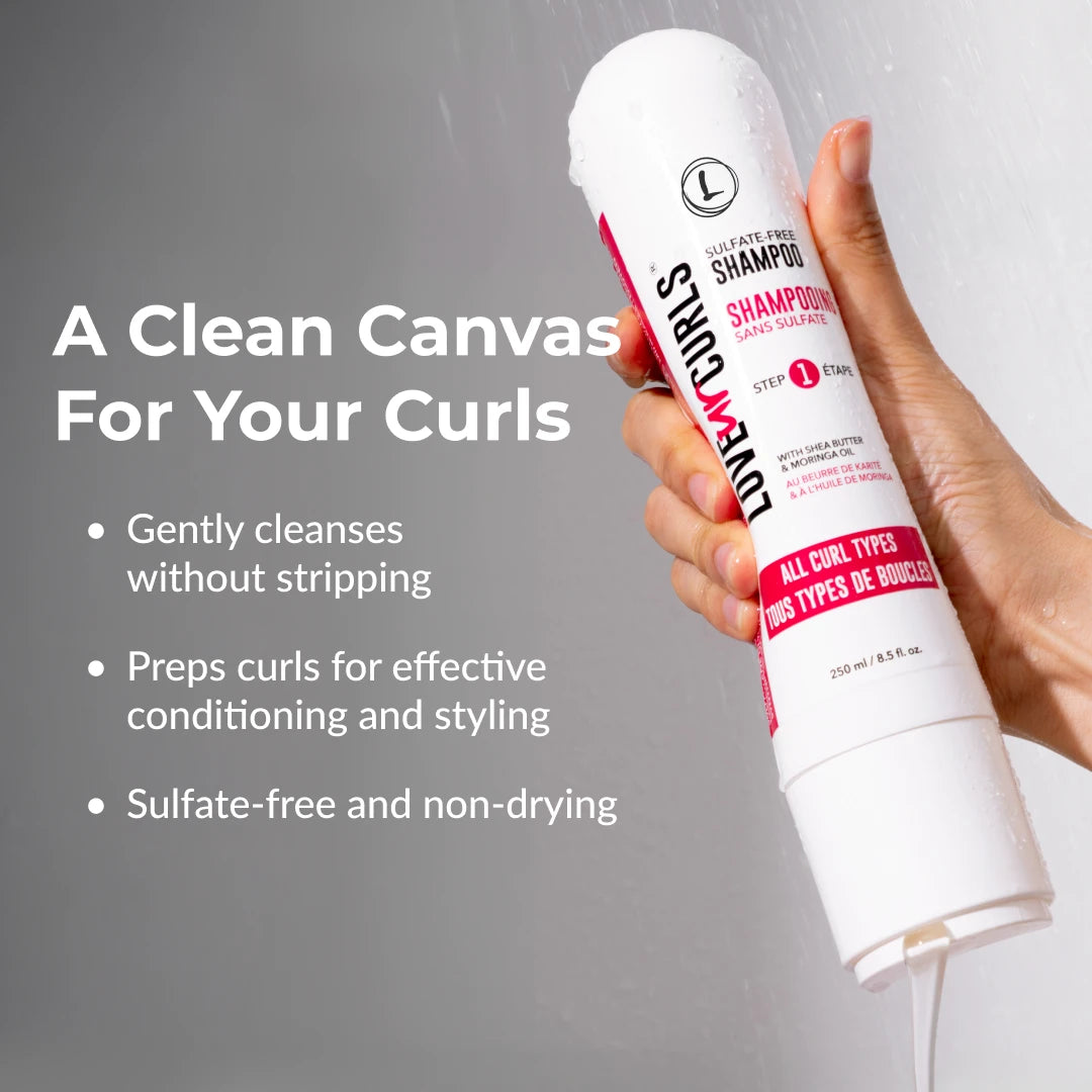 Shampoo bottle held by a hand with product details on a gray background
